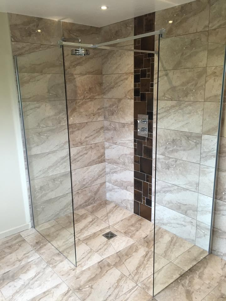 Marble tiled walk-in shower installation